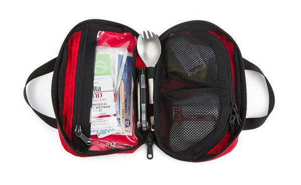 Interior shot of a filled First Aid Pouch in Red